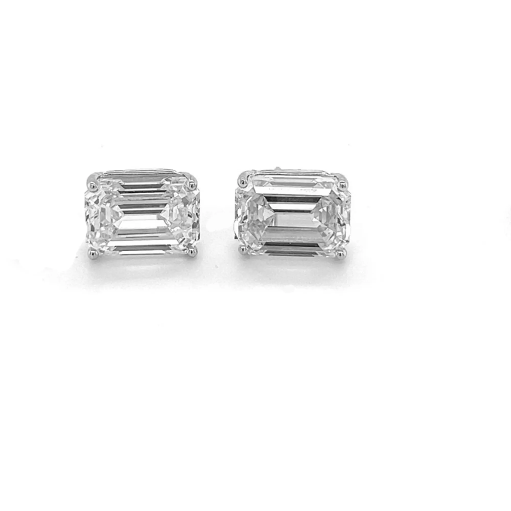 Diamond Stud Earrings - Emerald Cut Four Carats Each Ear